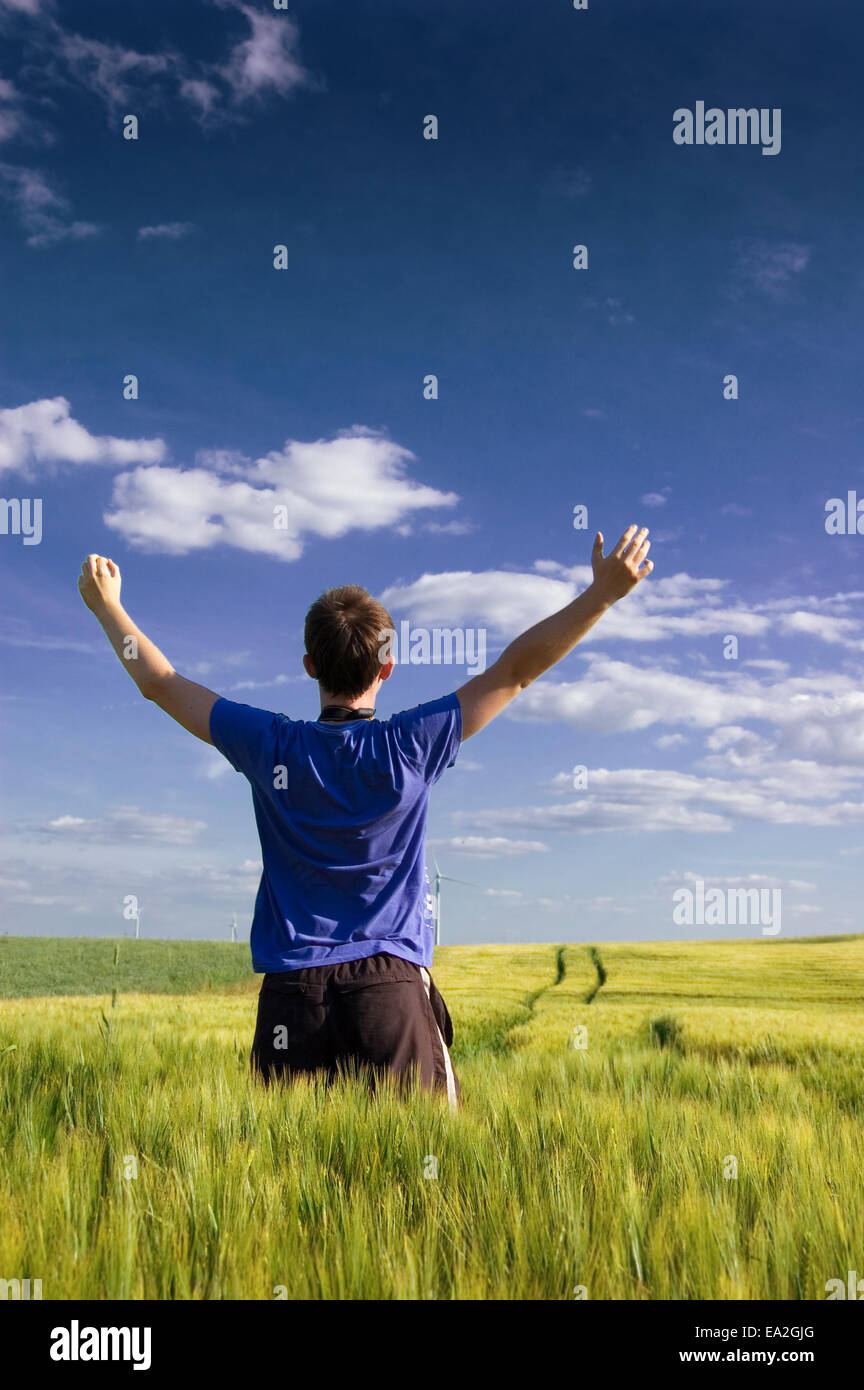 Man standing rising hand hi-res stock photography and images - Alamy