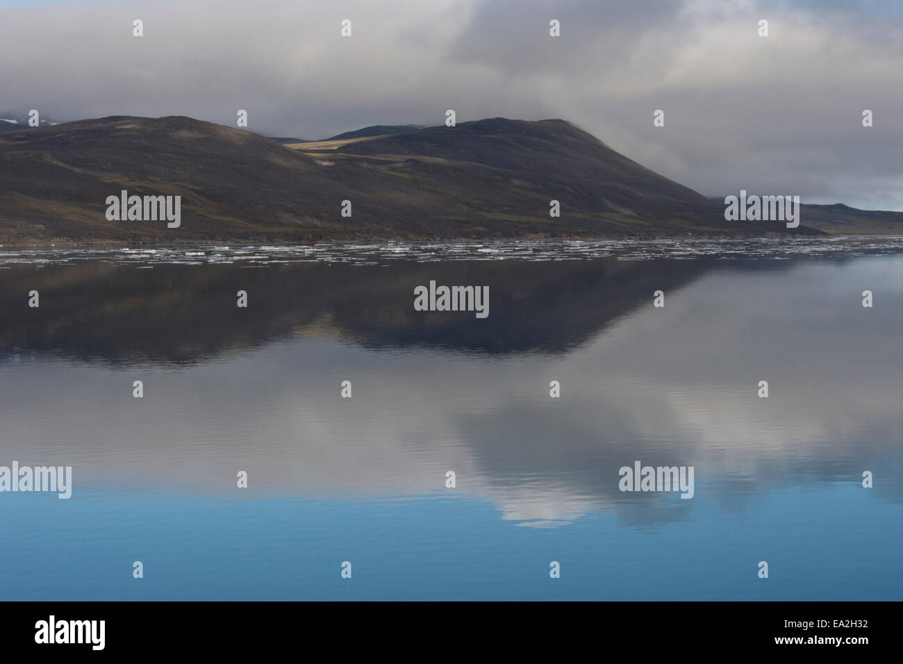 Icebergs and reflections at Baffin Island, Canadian Arctic. Stock Photo