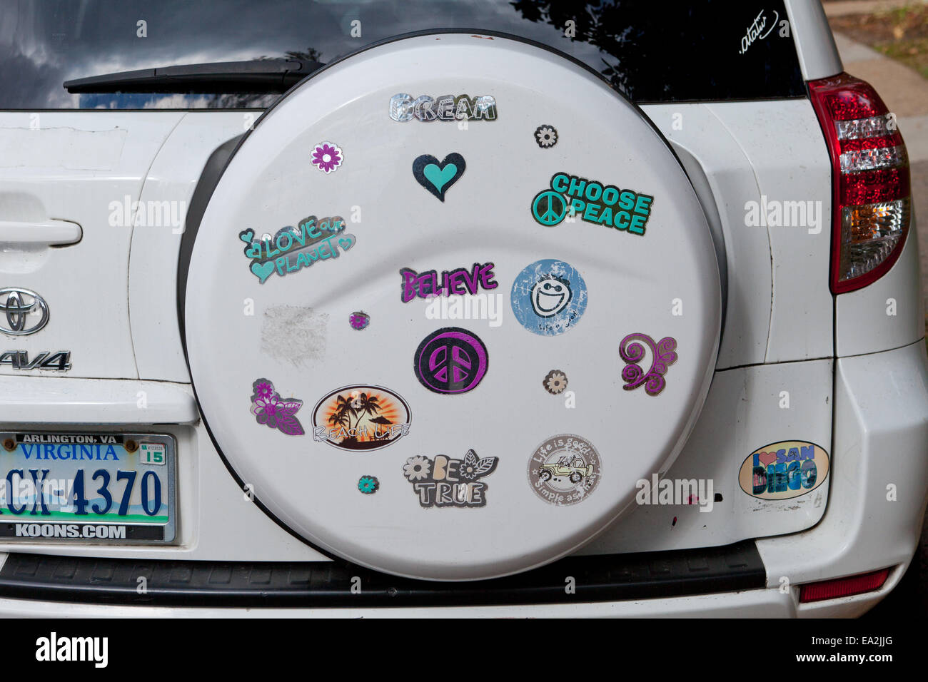 Bumper stickers on teenage girl's car - USA Stock Photo