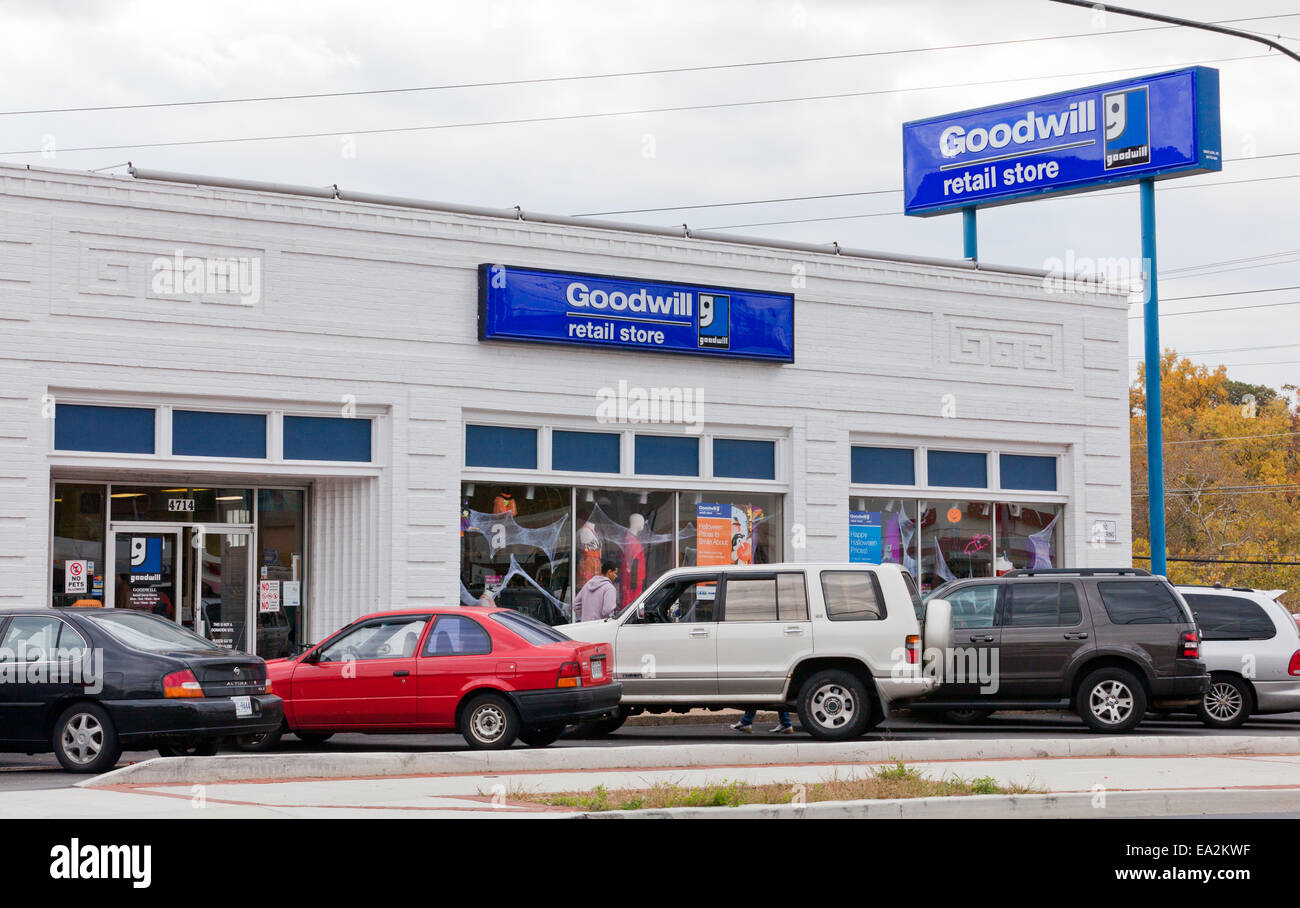 colorful shoes for sale at a Goodwill store in New Jersey USA donated items  lightly used and near new cheap Stock Photo - Alamy