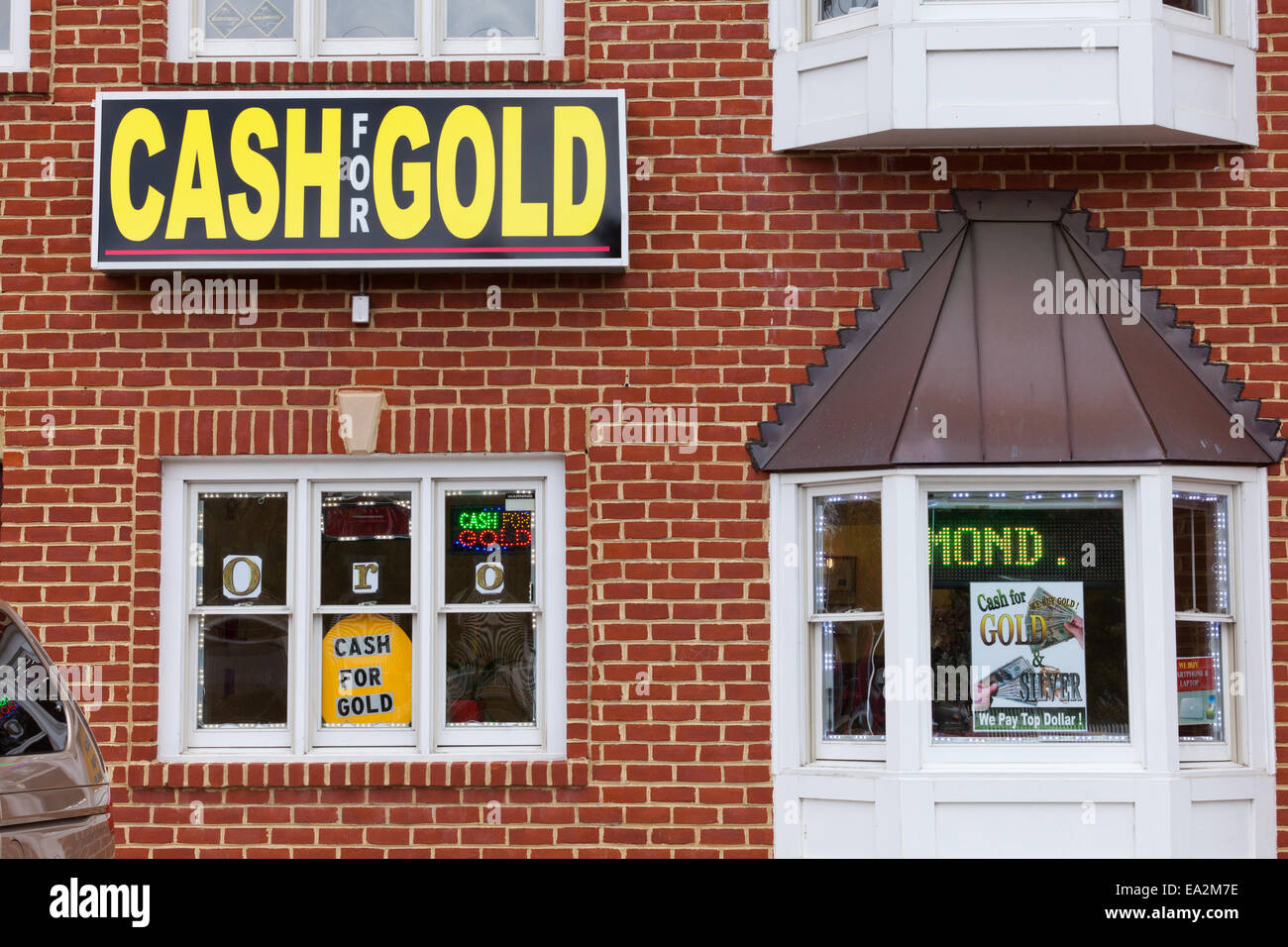 Cash for Gold sign on gold buyer store - USA Stock Photo