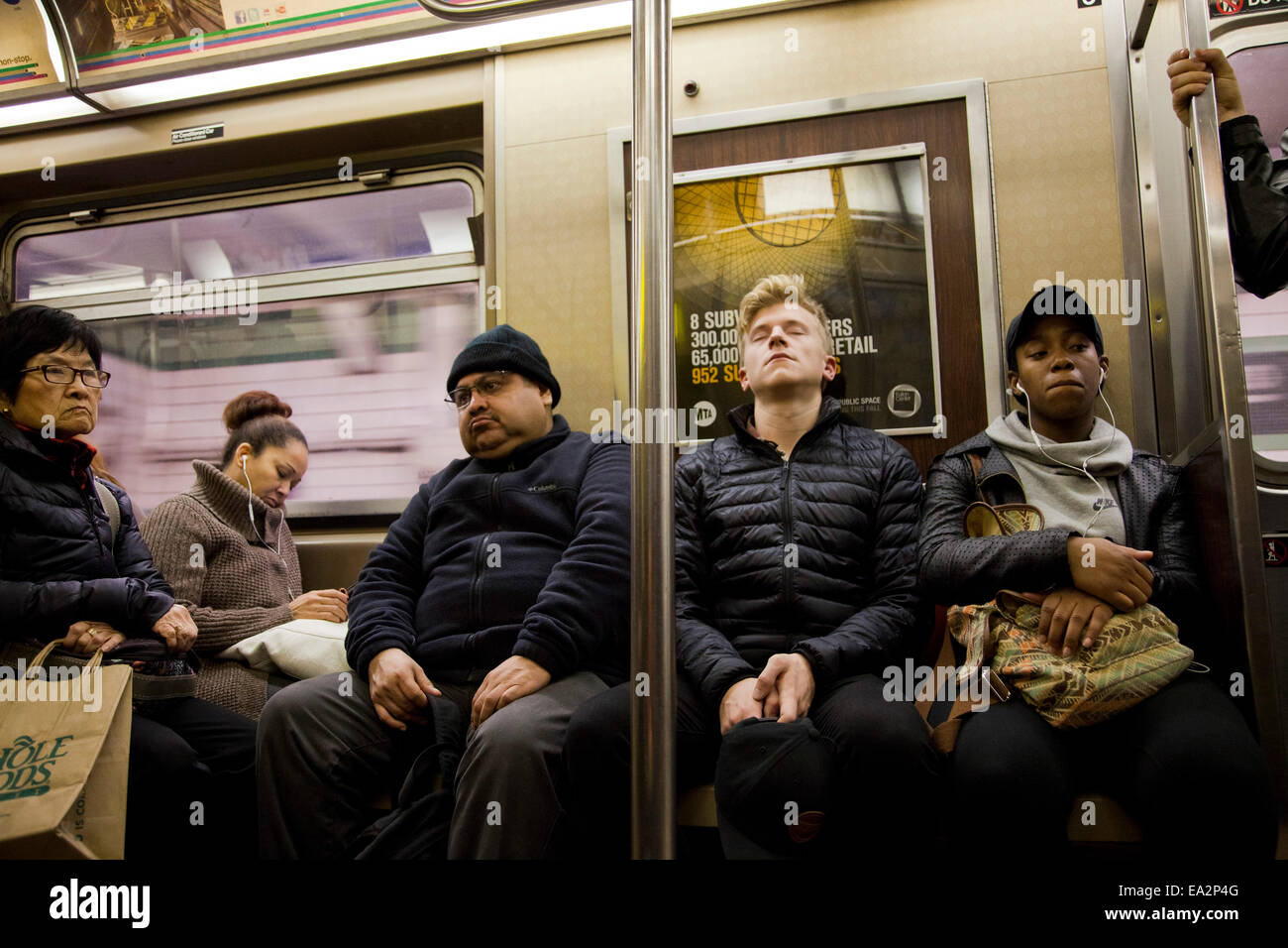 people riding on the New York City subway, New York, United States of America Stock Photo