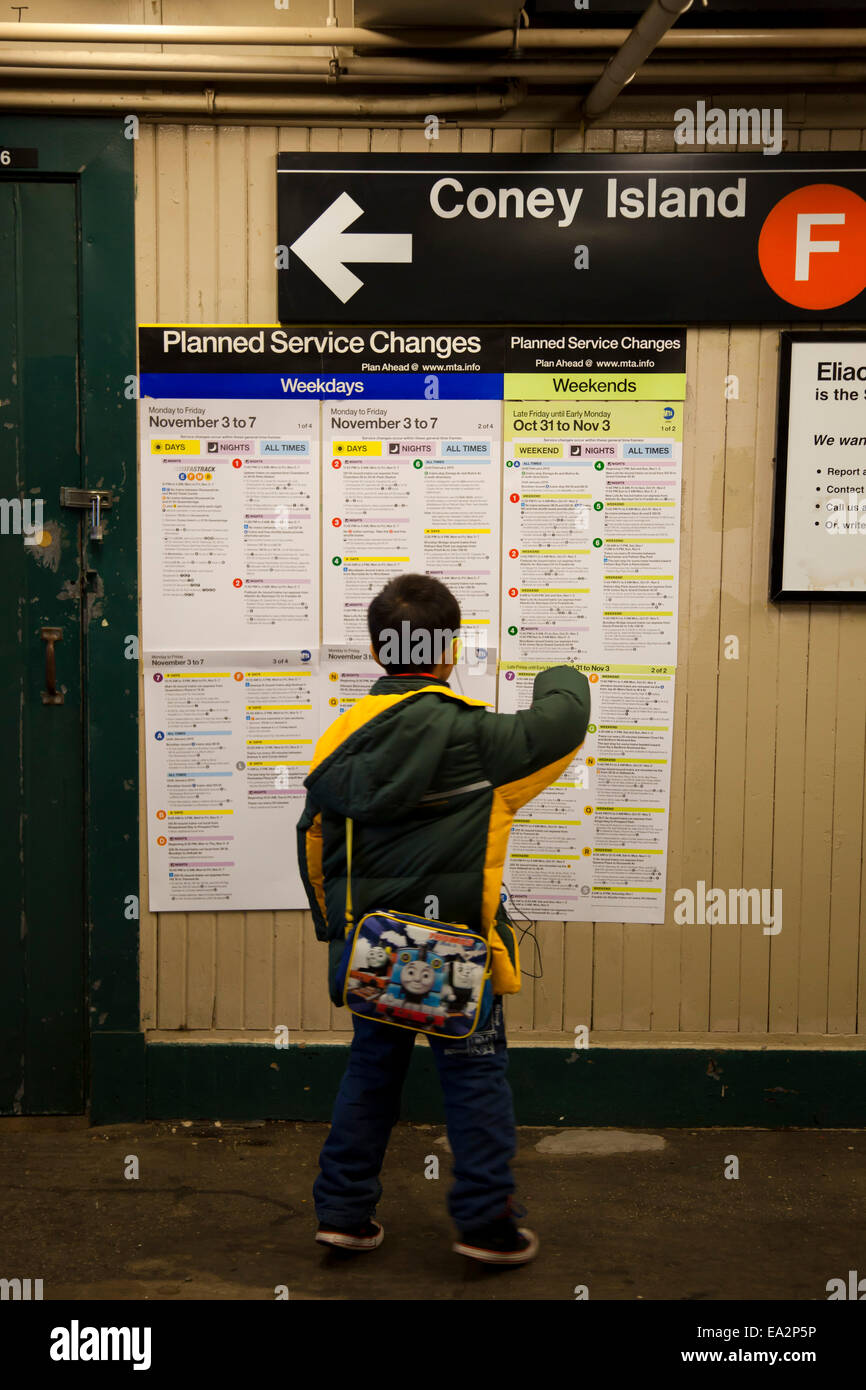 a boy navigates the subway, New York, United States of America Stock Photo