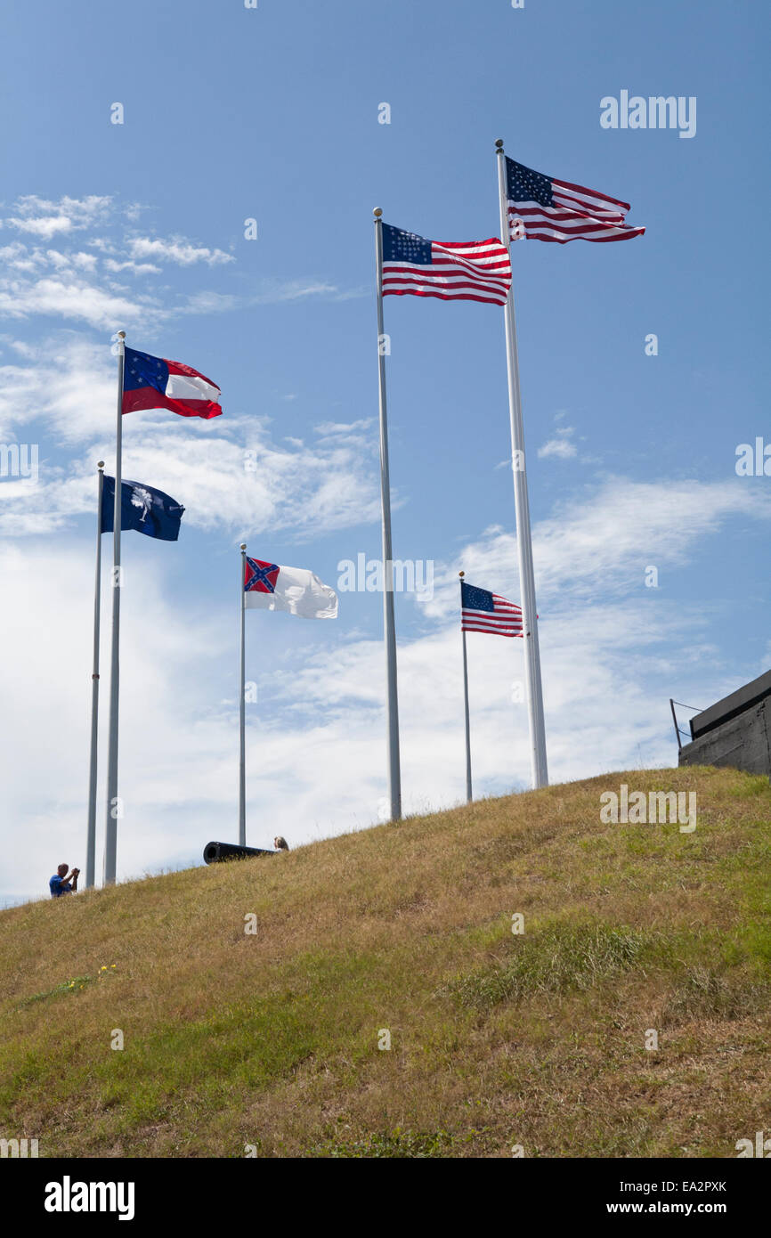Group of flagpoles with every flag flown over Fort Sumter during the American Civil war, and a current American flag Stock Photo