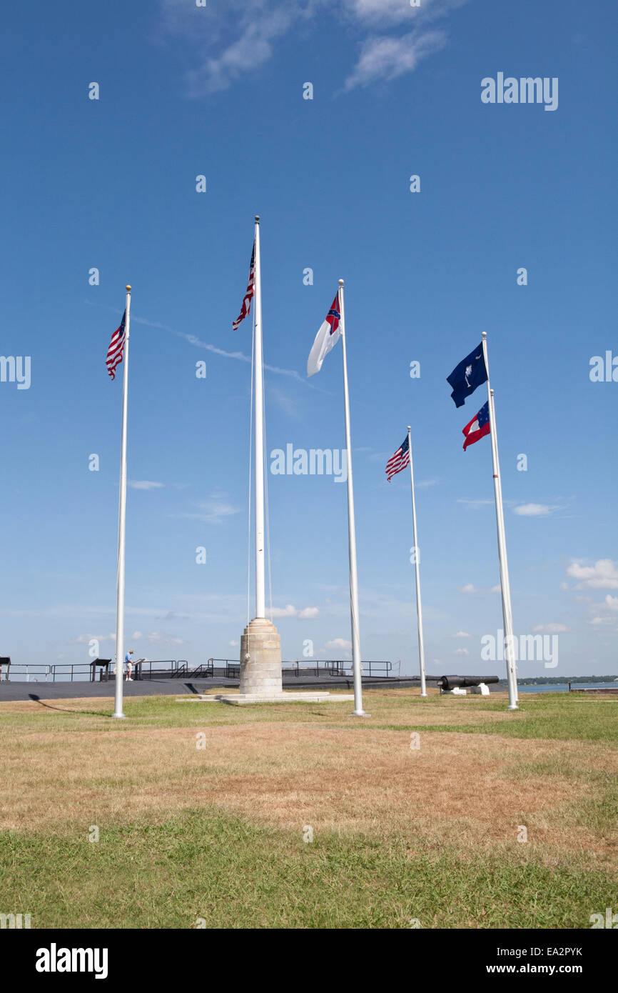 Group of flagpoles with every flag flown over Fort Sumter during the American Civil war, and a current American flag Stock Photo