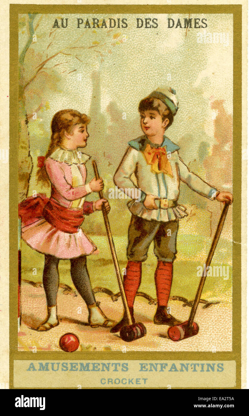 Card depicting two children playing croquet Stock Photo Alamy