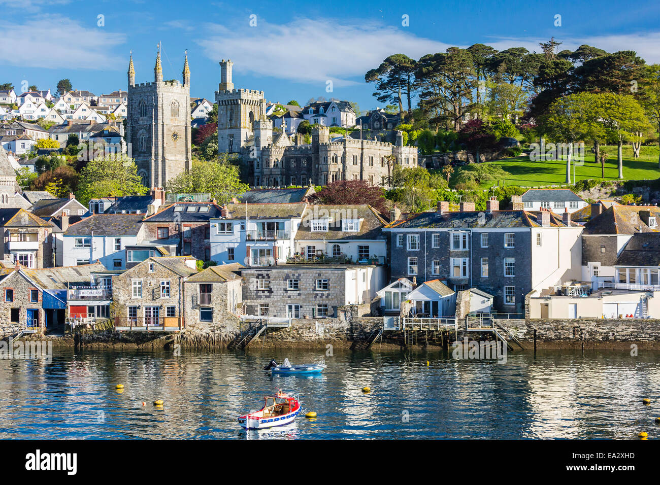 Early morning light on small boats at anchor in the harbour at Fowey, Cornwall, England, United Kingdom, Europe Stock Photo