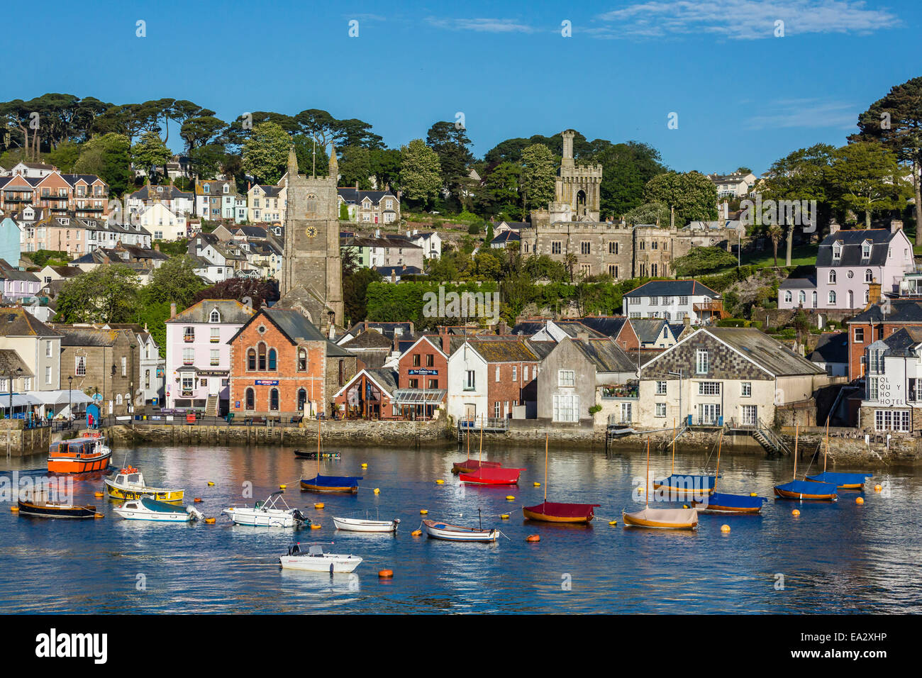 Early morning light on small boats at anchor in the harbour at Fowey, Cornwall, England, United Kingdom, Europe Stock Photo