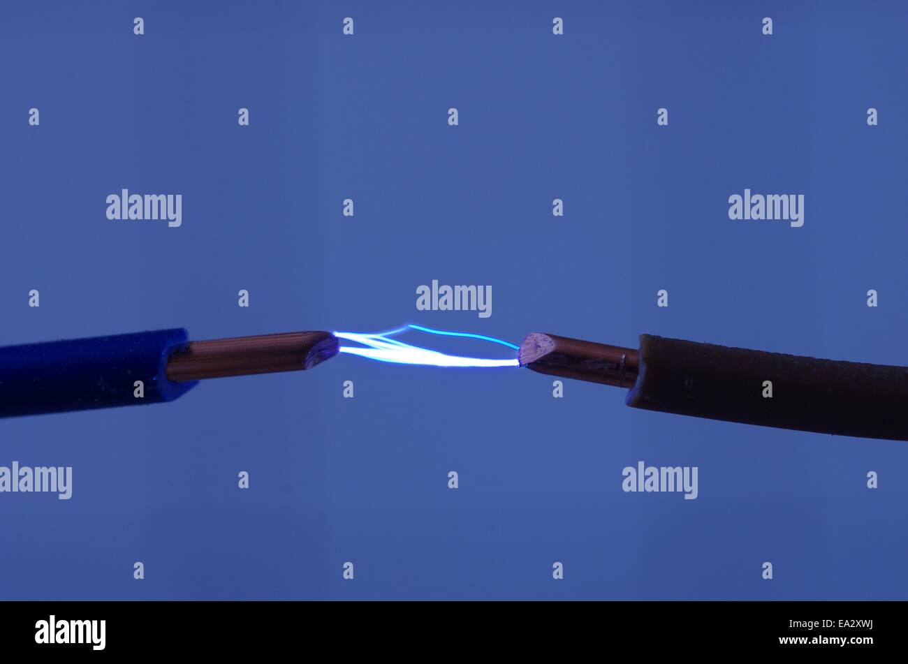 short-circuit among lines on blue background Stock Photo