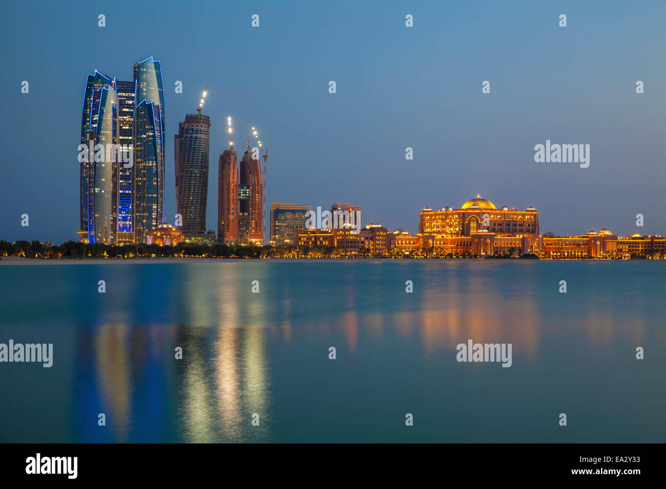 City skyline looking towards the Emirates Palace Hotel and Etihad Towers, Abu Dhabi, United Arab Emirates, Middle East Stock Photo