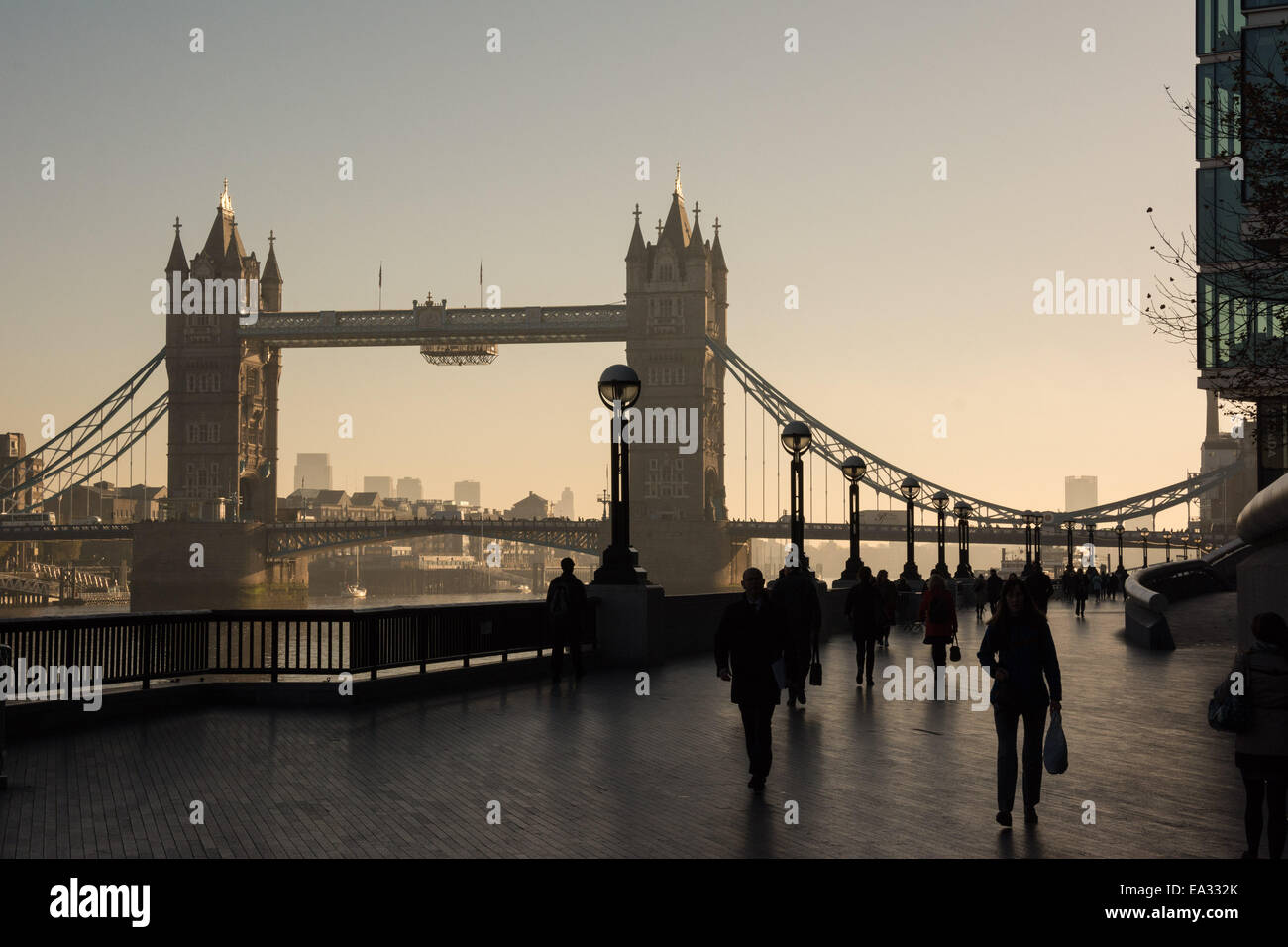 London, UK. 6th Nov, 2014.  The falling UK temperatures herald winter is coming as London wakes to a frosty Autumnal morning. The city is covered in golden mist as the sunrises. Credit:  Patricia Phillips/Alamy Live News Stock Photo