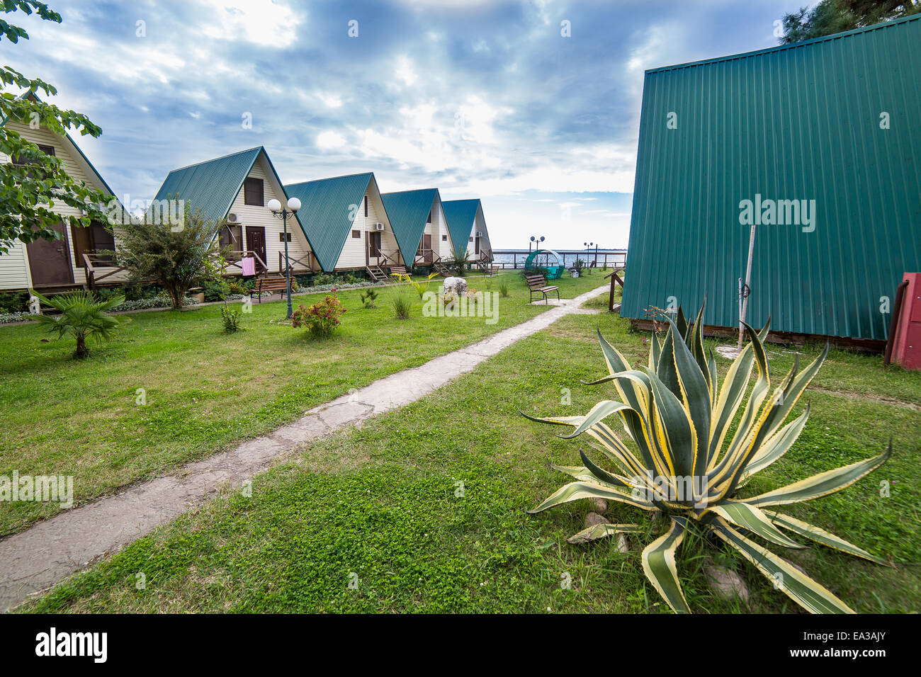 Wooden cottages, Black sea shore, Abkhazia Stock Photo