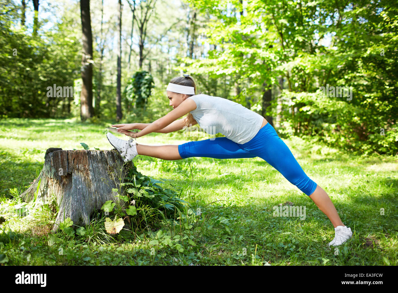 Young athletic girl in the park Stock Photo Alamy