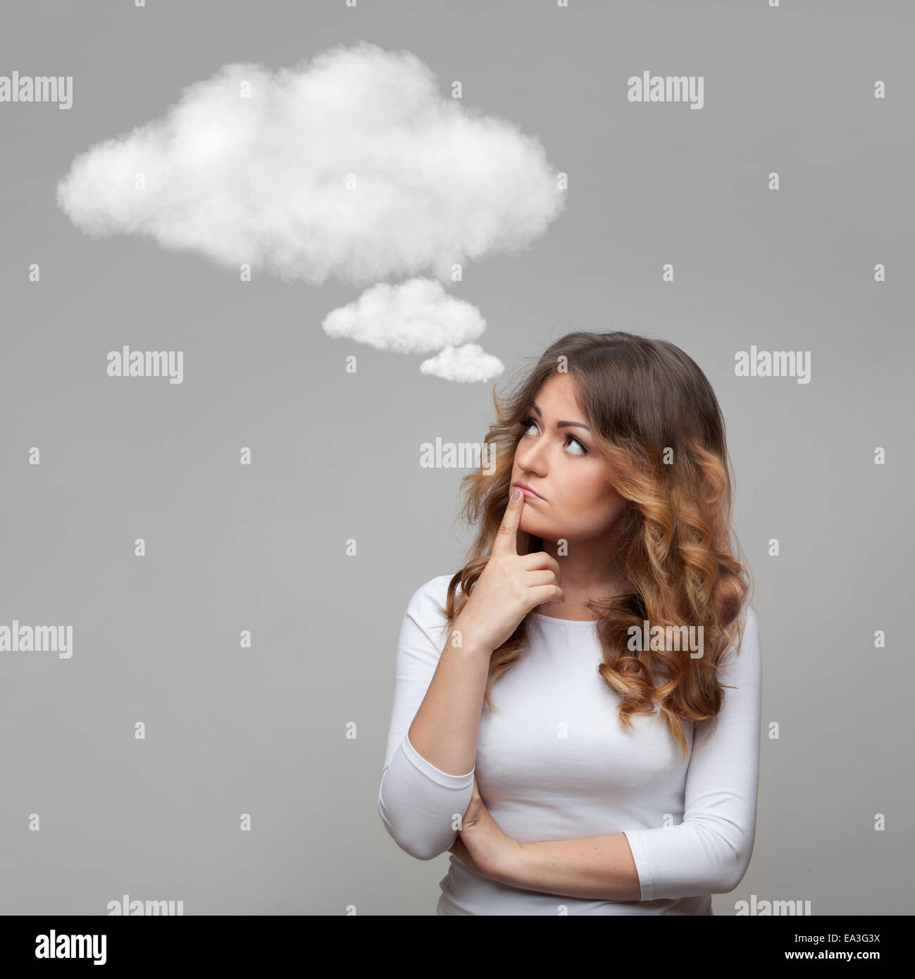 Thinking woman and empty cloud Stock Photo