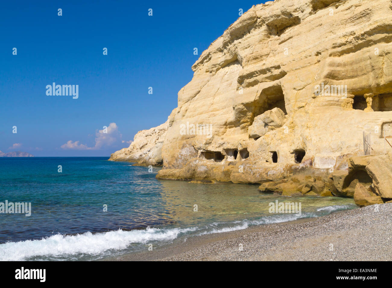 Matala sandstone hippie caves on Crete by the sea in Greece Stock Photo