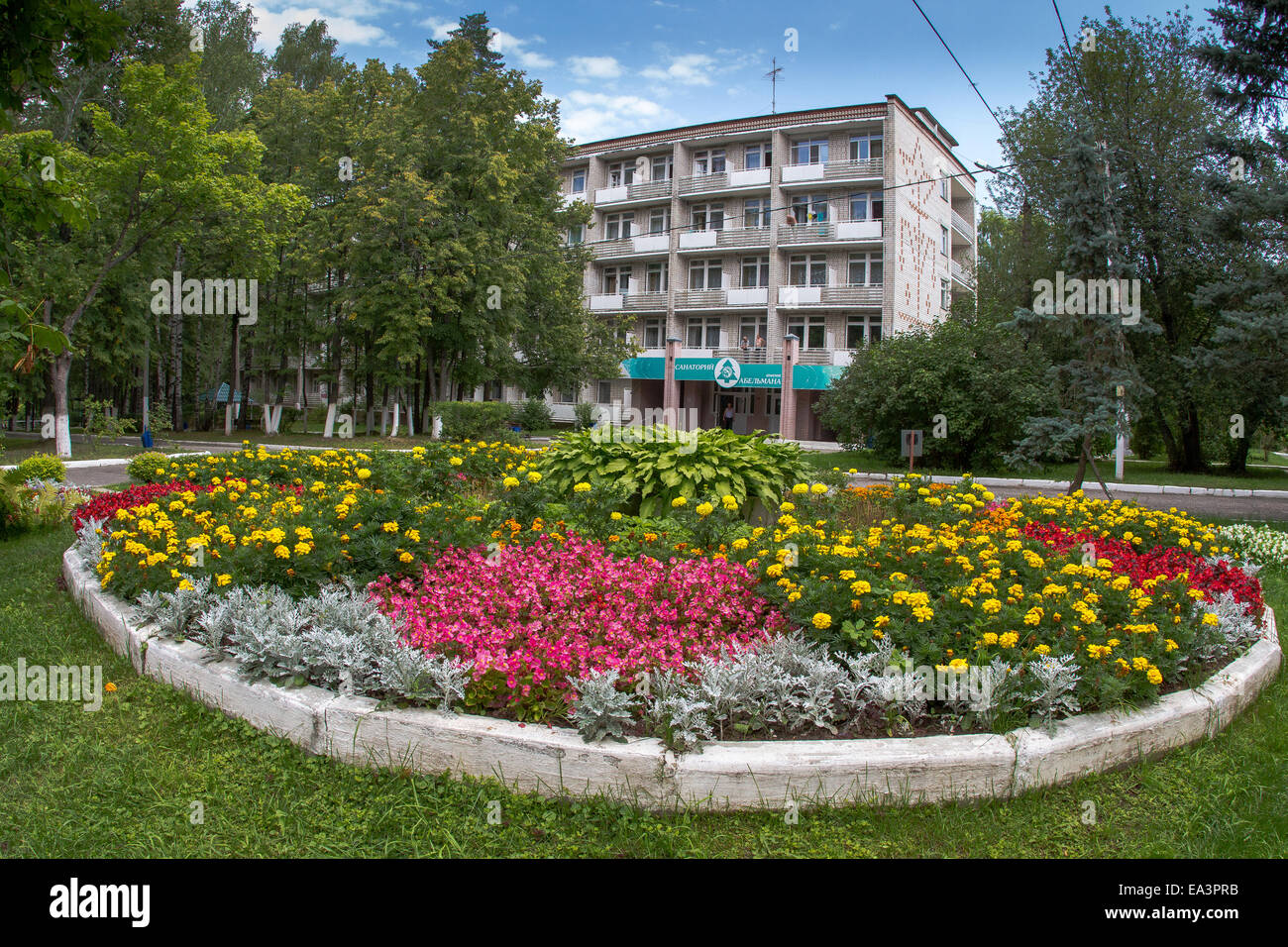 Flowerbed and hotel building, Vladimir region, Russia Stock Photo