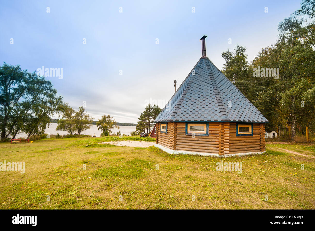 Wooden house at riverbank, Volga river, Tver region, Russia Stock Photo