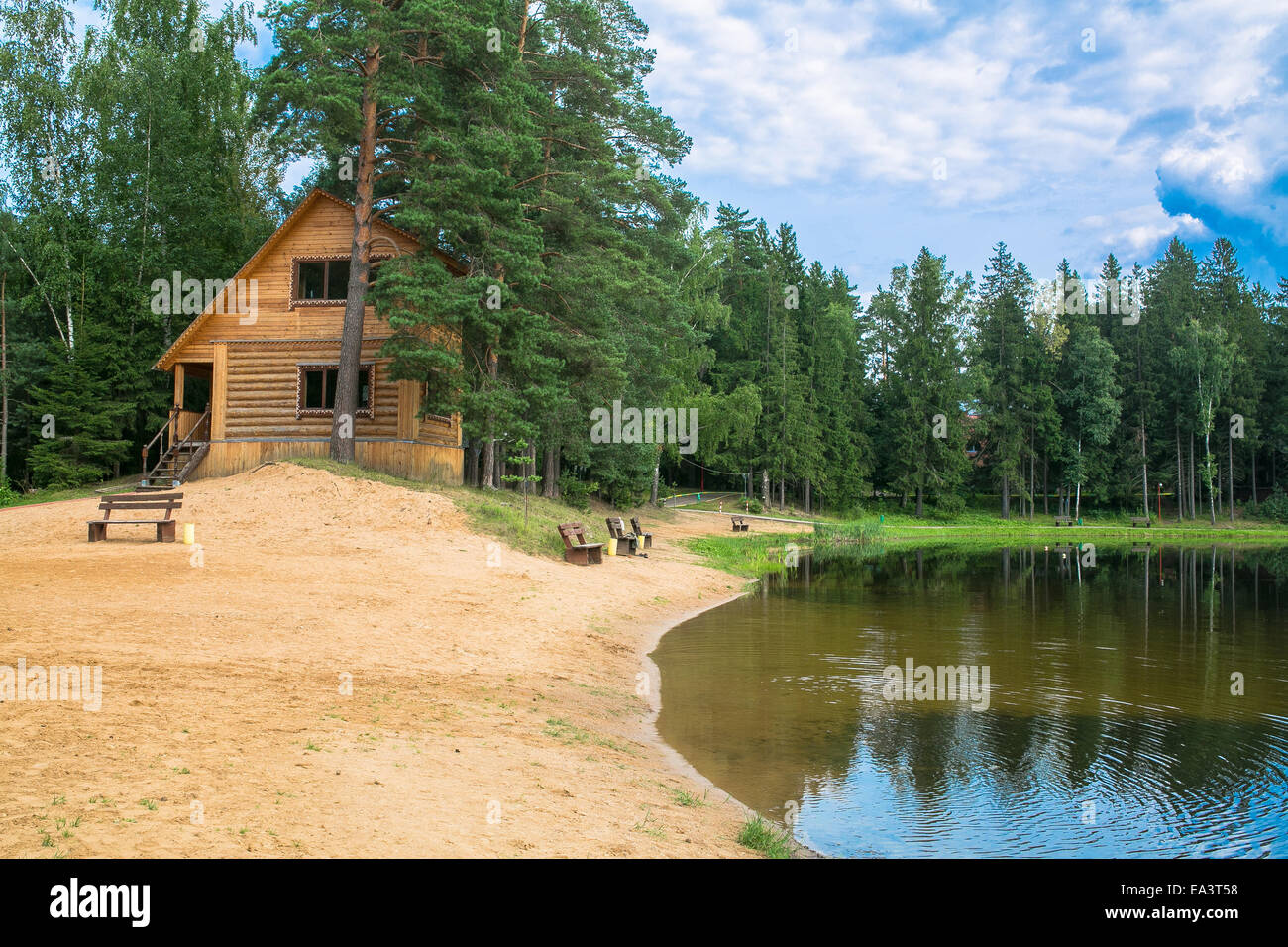 Wooden house at lake's shore, Moscow region, Russia Stock Photo