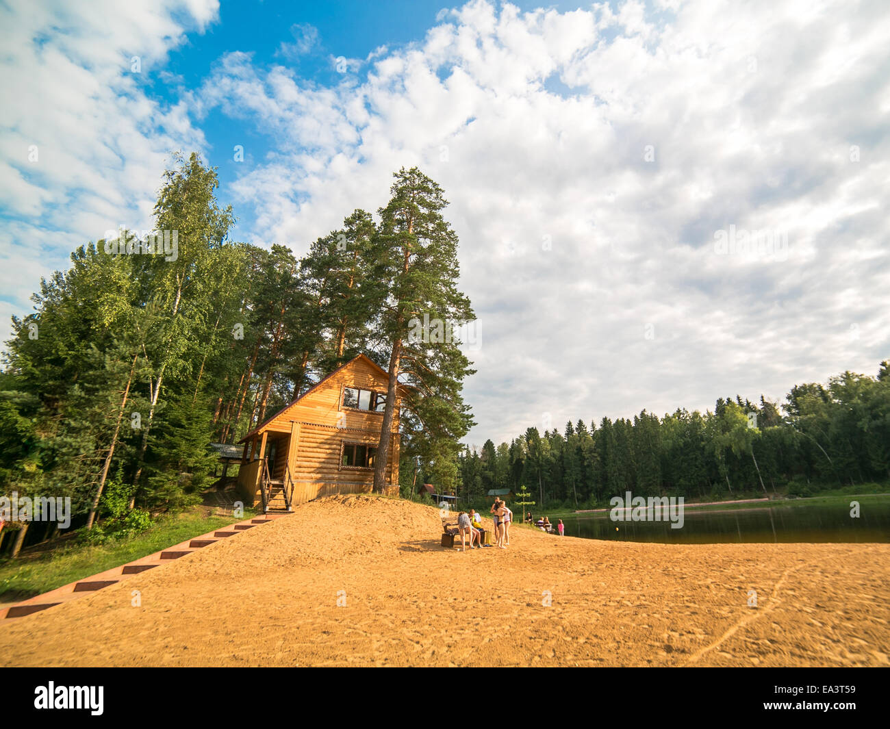 Wooden house at lake's shore, Moscow region, Russia Stock Photo
