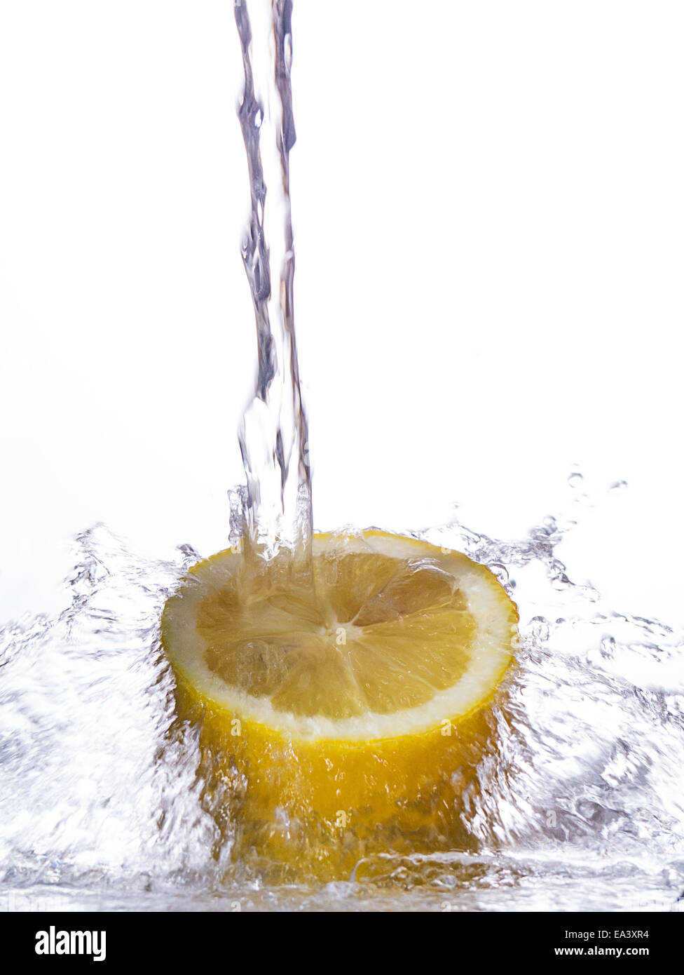 Jet of water on a lemon Stock Photo