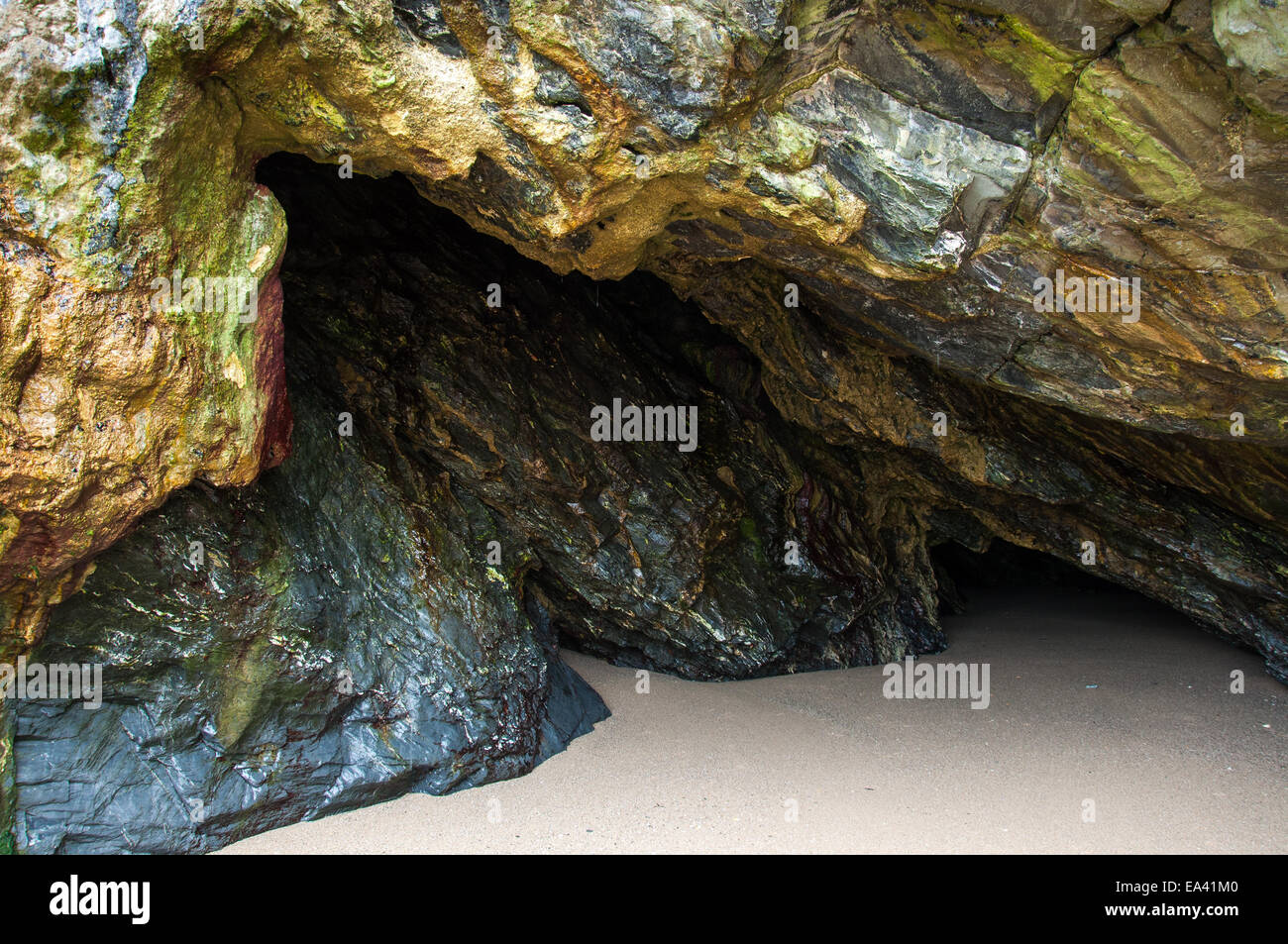 Cave on Holywell Bay beach in North Cornwall Stock Photo Alamy