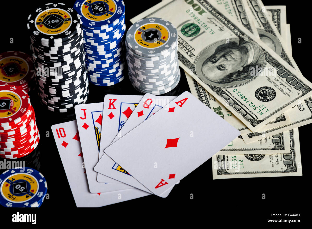 Poker chips Playing cards and dollars Stock Photo Alamy