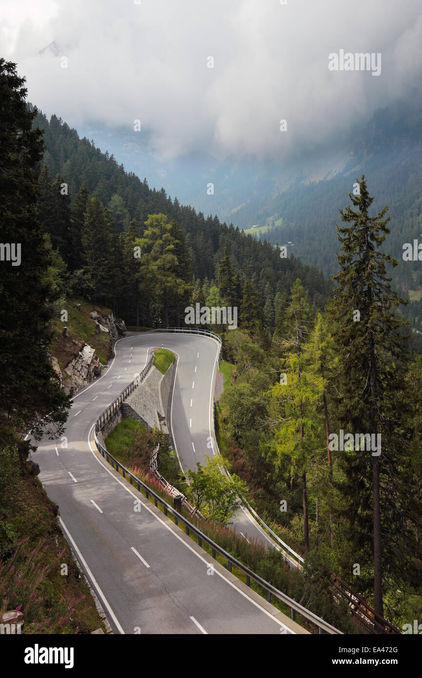 Winding and dangerous mountain road Stock Photo