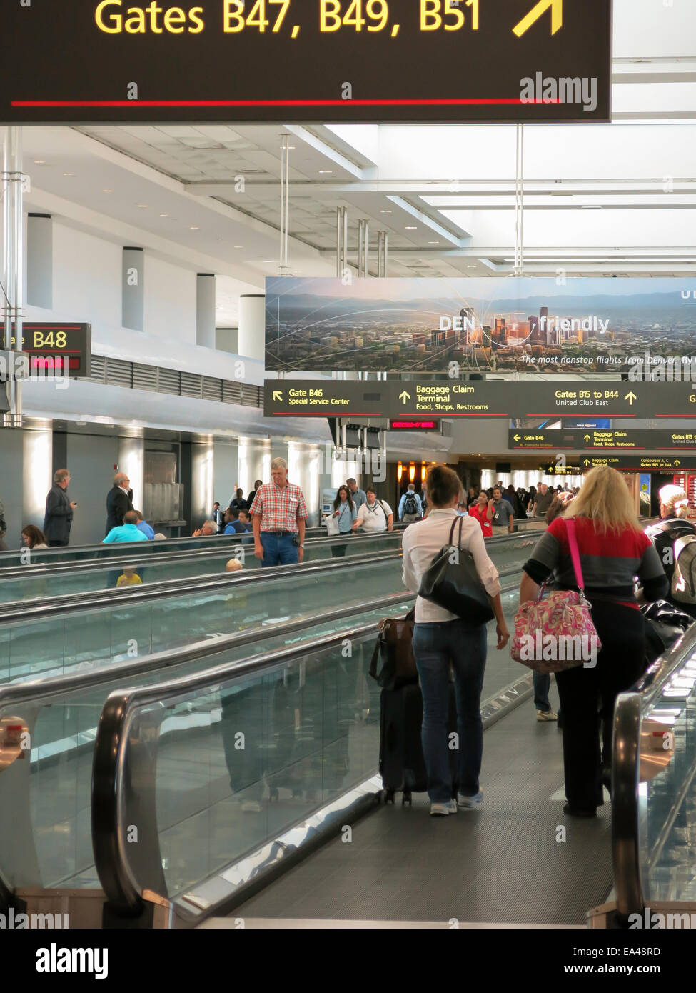 Airport Travelers, Moving Sidewalks and Gates, United Terminal, Denver International Airport, CO Stock Photo