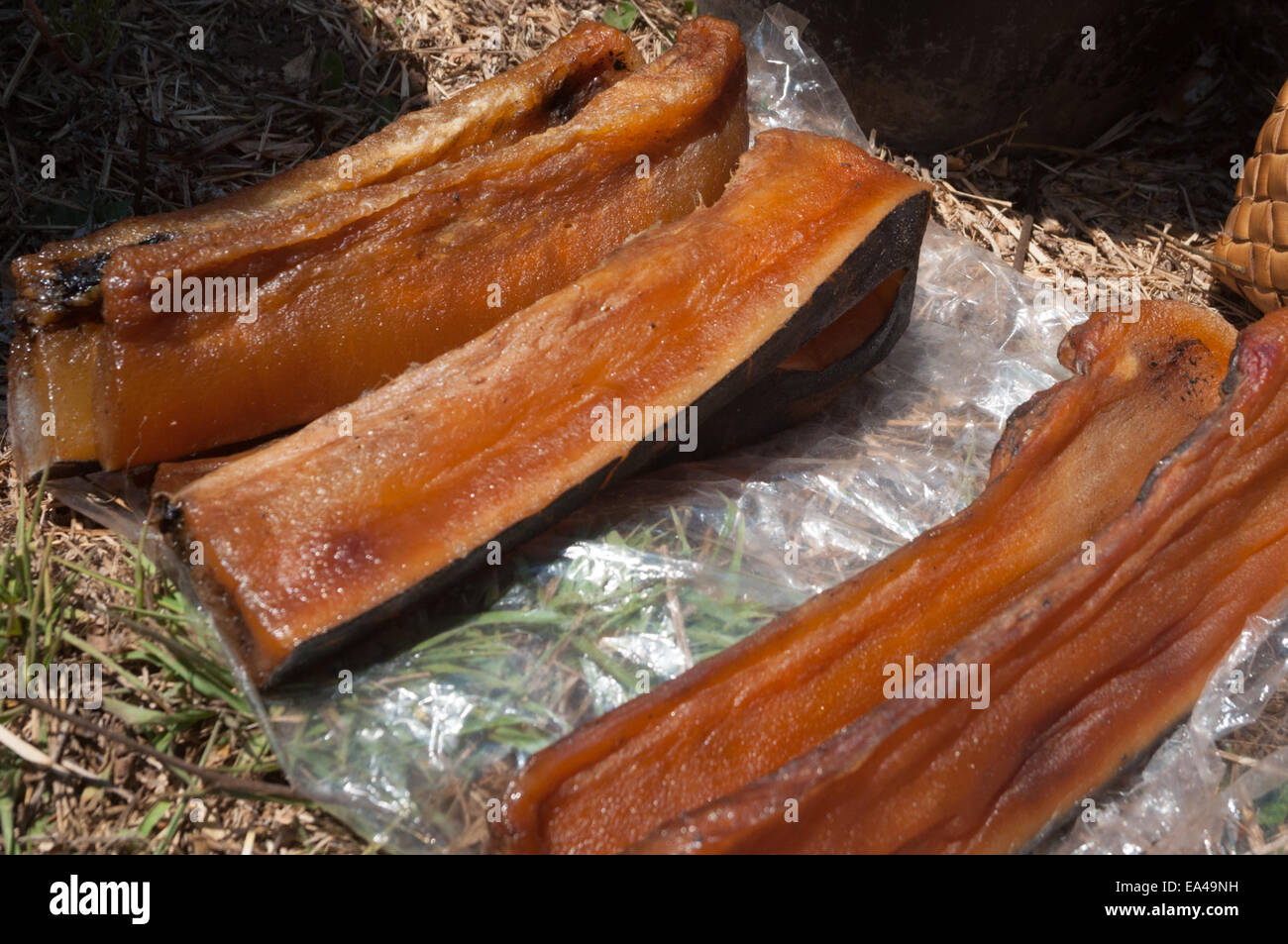 Dried whale meat from Lamalera village being displayed at a barter market in Wulandoni village, Lembata Island, Indonesia. Stock Photo