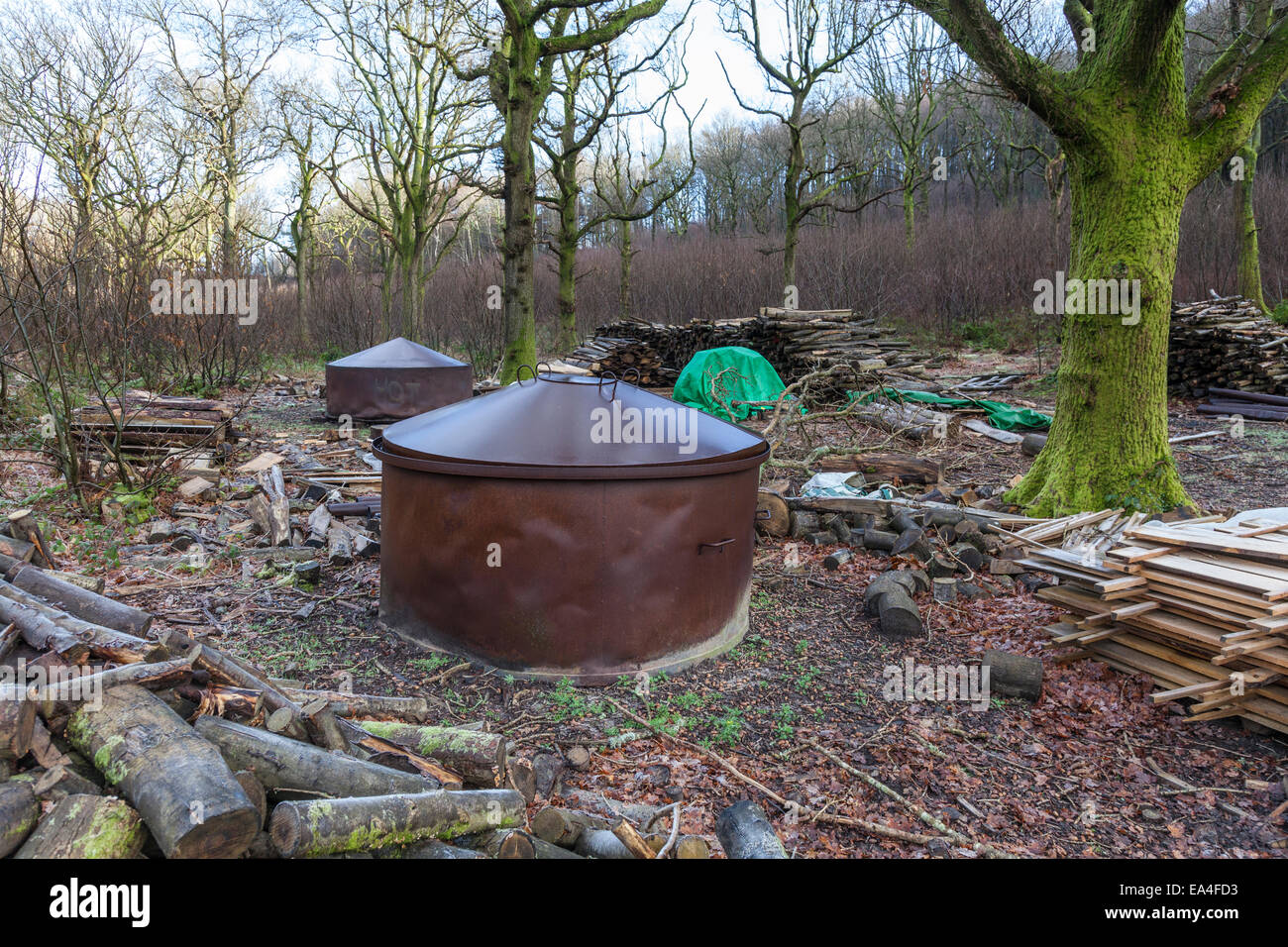 Charcoal furnaces in a woodland clearing Stock Photo Alamy