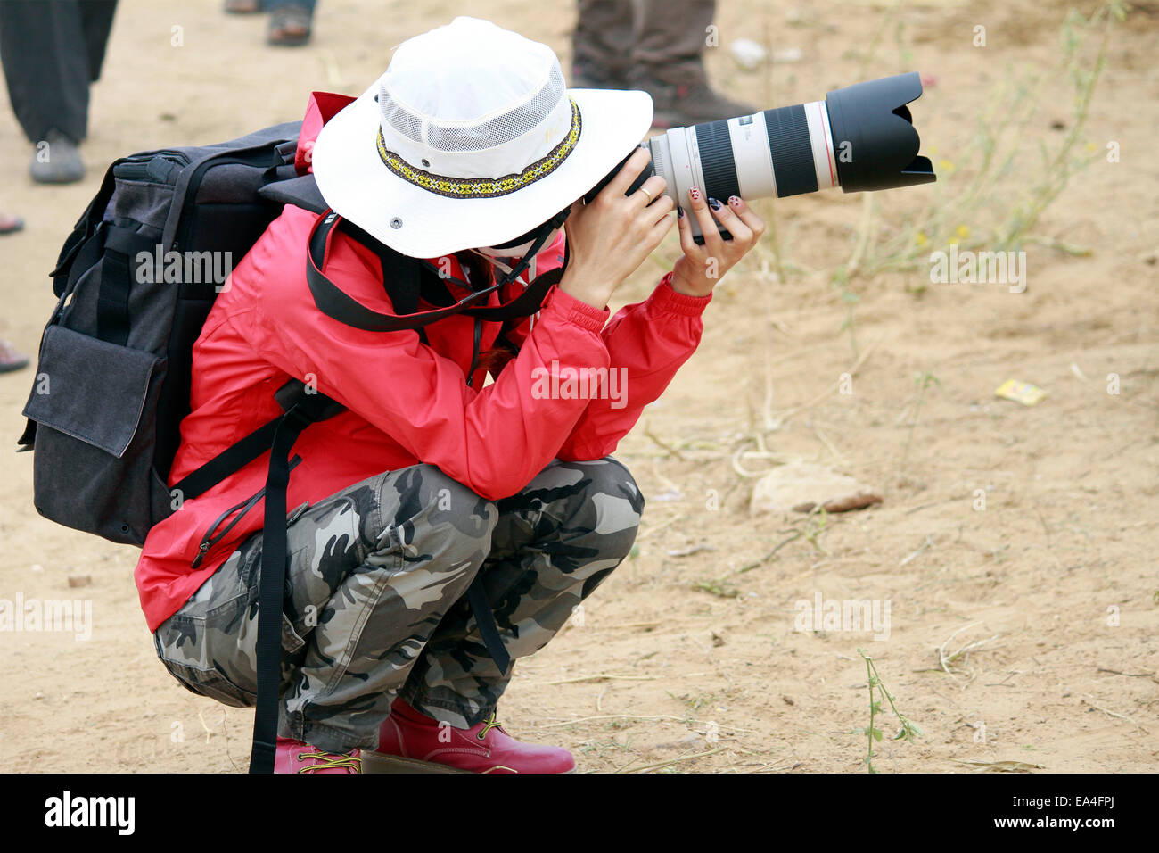 cameraman, tourist, foreign, female, canon, DSLR, shooting, in Pushkar, Rajasthan, India. Stock Photo