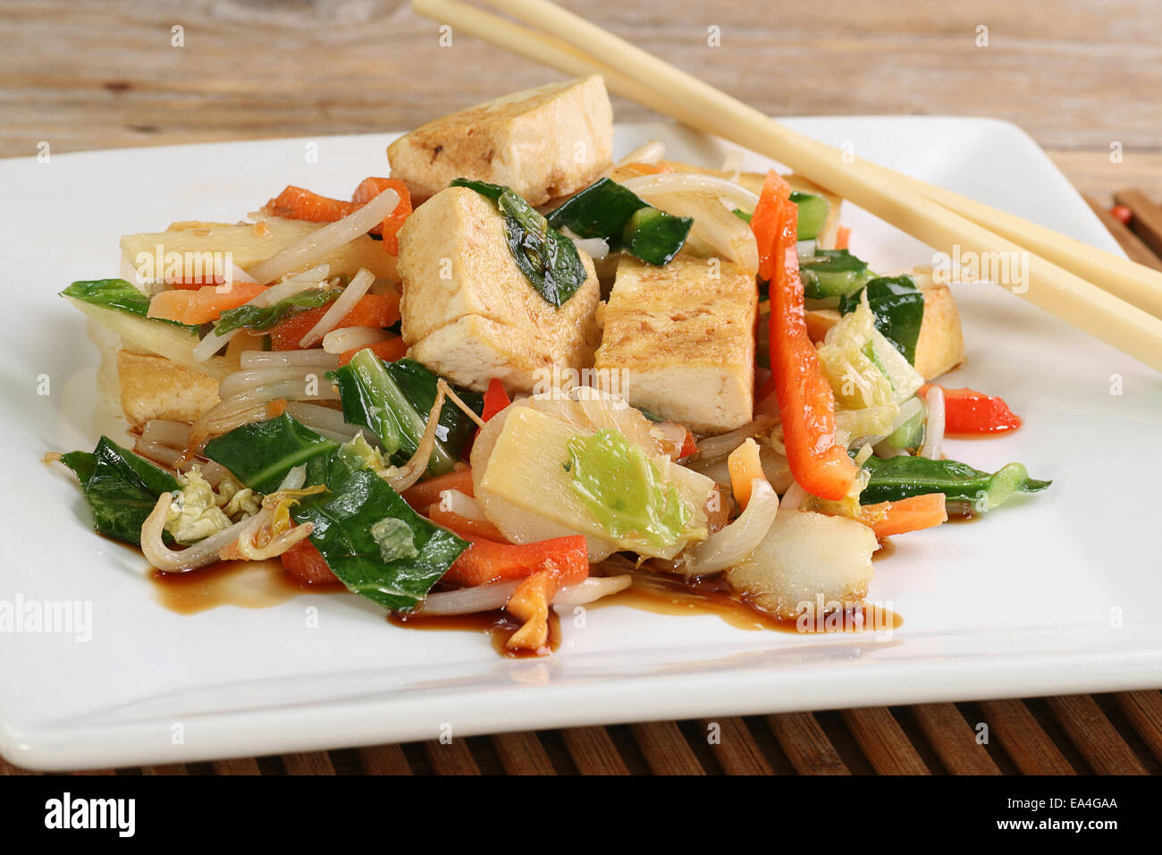 vegetarian tofu and mixed vegetable stir fry Stock Photo Alamy
