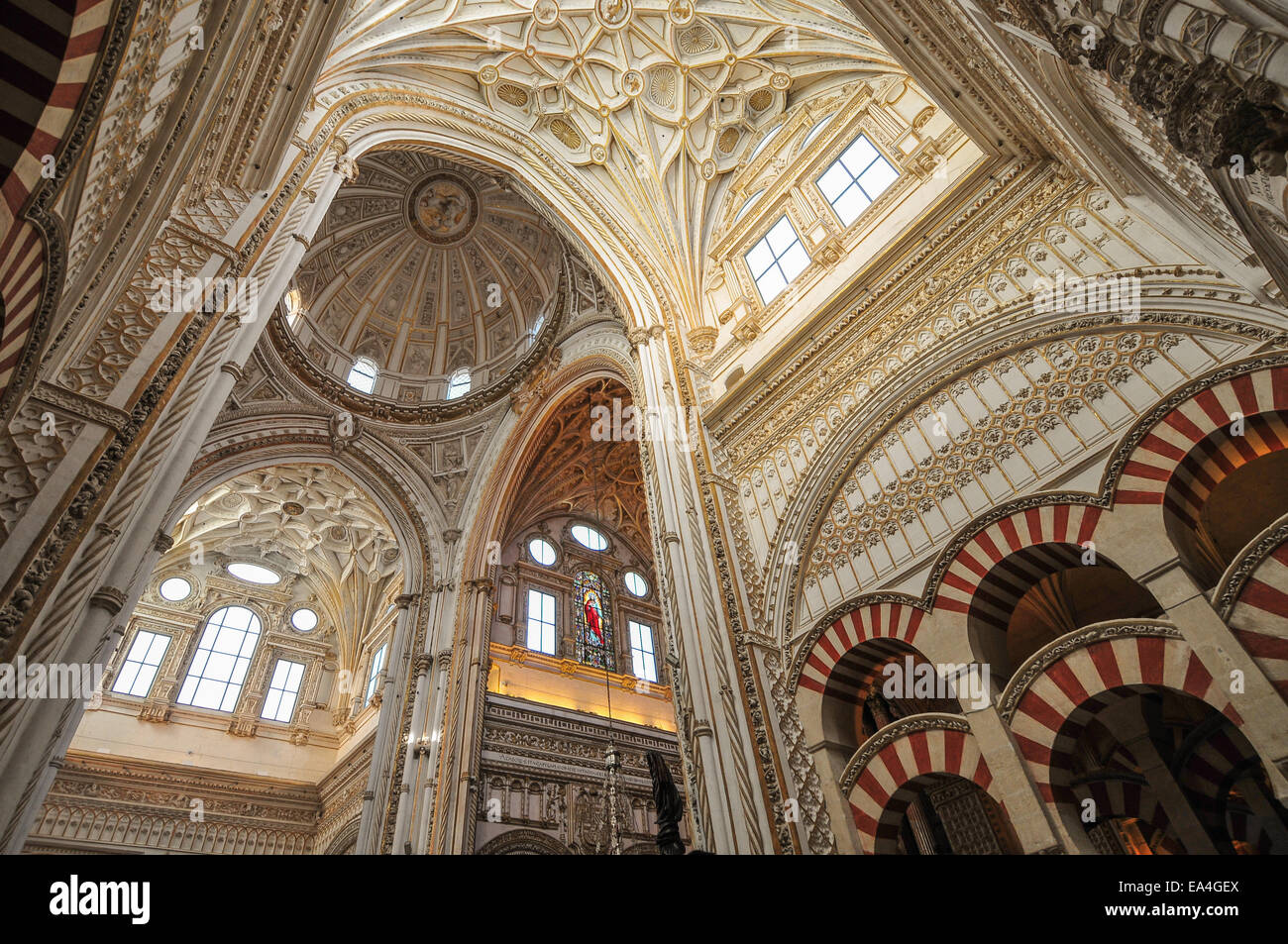 The inside of the Mosque-Cathedral of Cordoba (in Spanish: Mezquita-Catedral de Córdoba).    It was originally a Catholic Christ Stock Photo