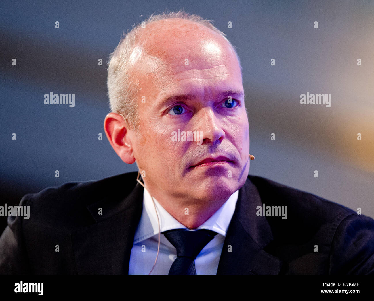 Speaker of the executive board of the British American Tobacco (Germany, BAT)  Ralf Wittenberg follows a conversation during the 6th 'Zeit' economic forum  in the church Sankt Michaelis, Hamburg, Germany, 06 November