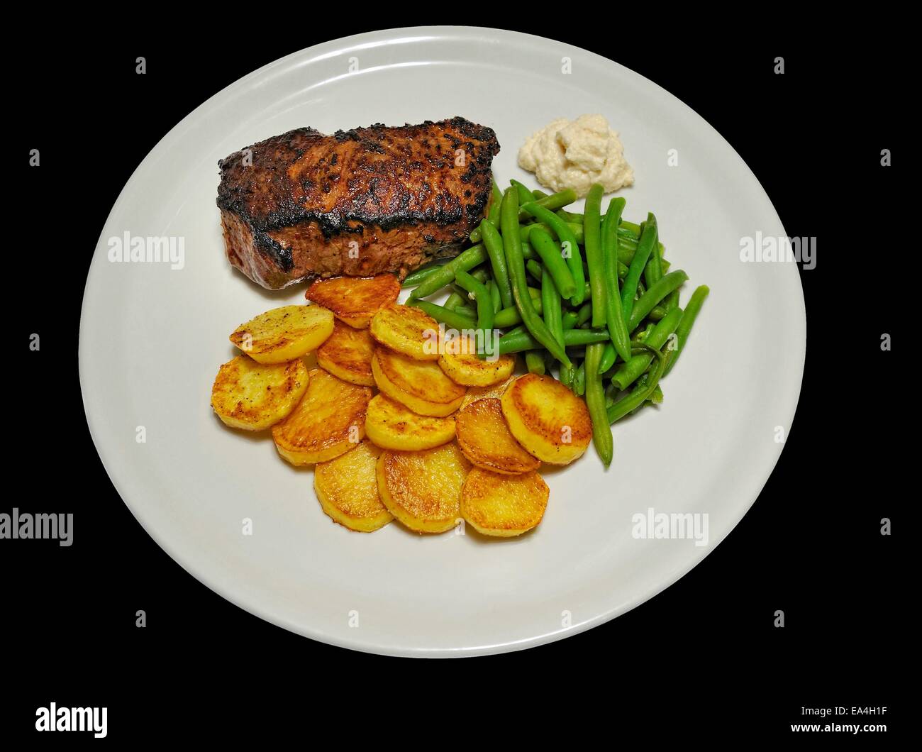 Steak mit Kartoffeln und Bohnen Stock Photo - Alamy