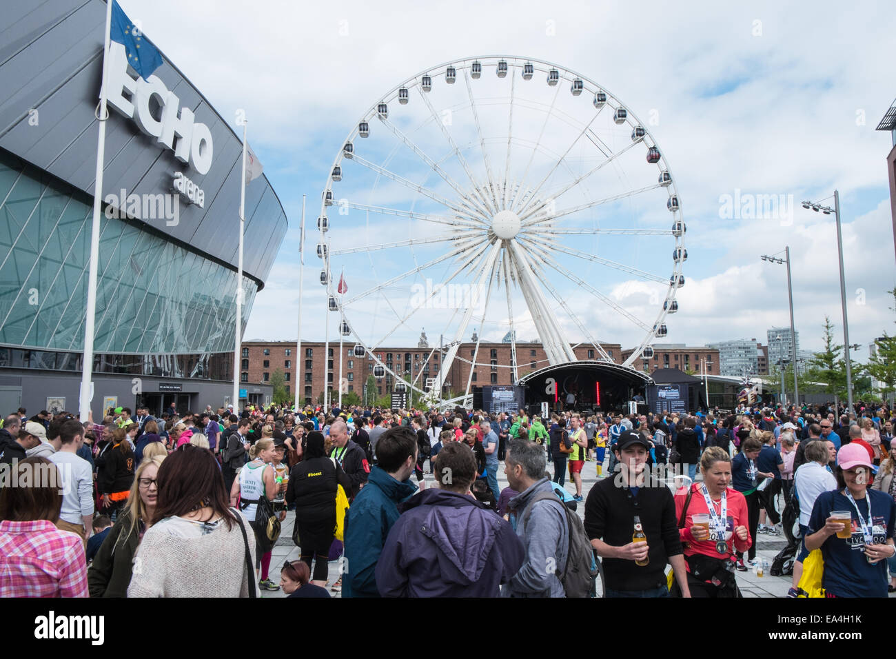 At the end of Liverpool Rock n Roll Marathon at riverside next to Liverpool Echo Arena and Big Ferris Wheel,Liverpool,England, Stock Photo