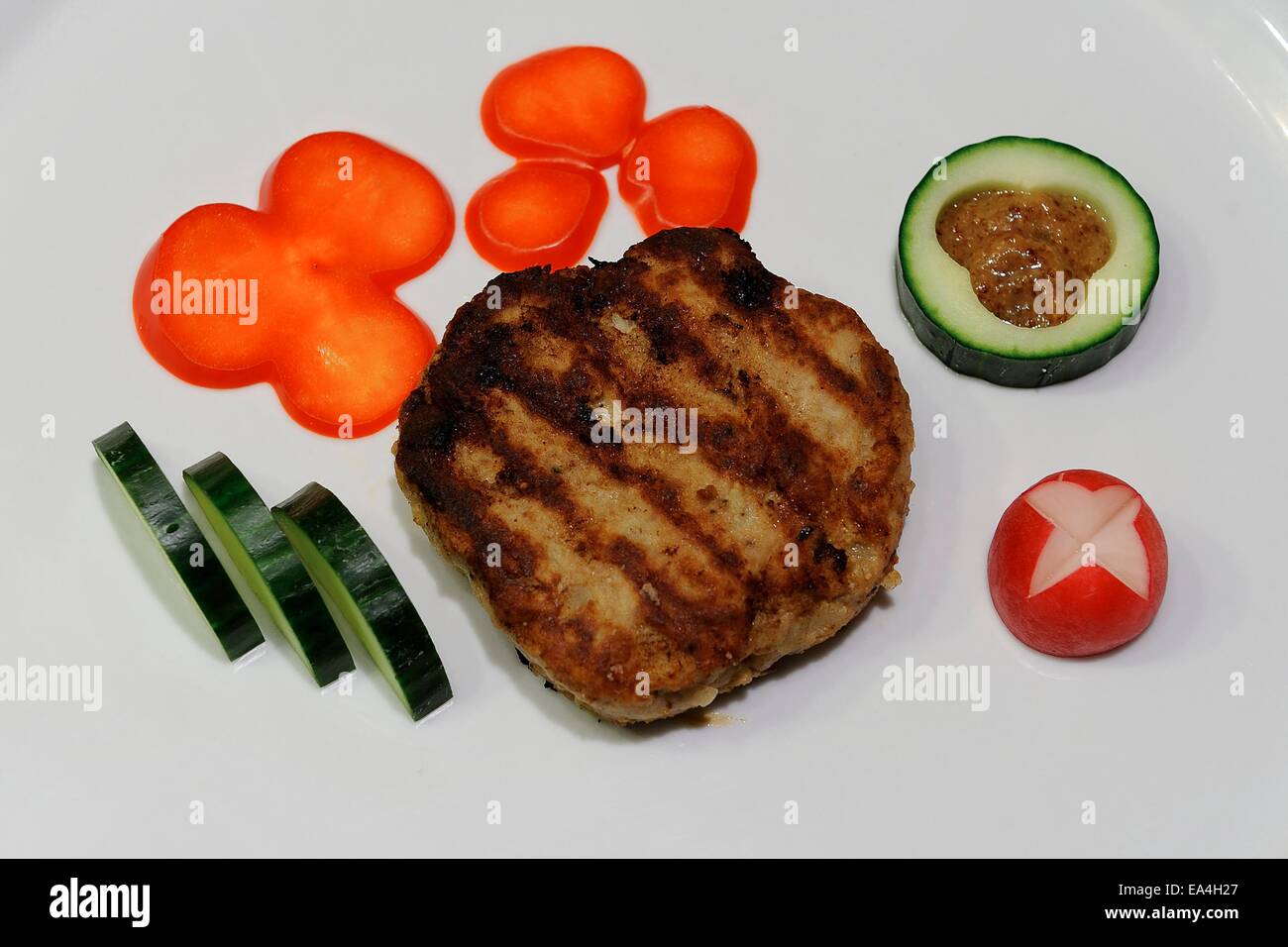 Rissole snack with cucumber Stock Photo