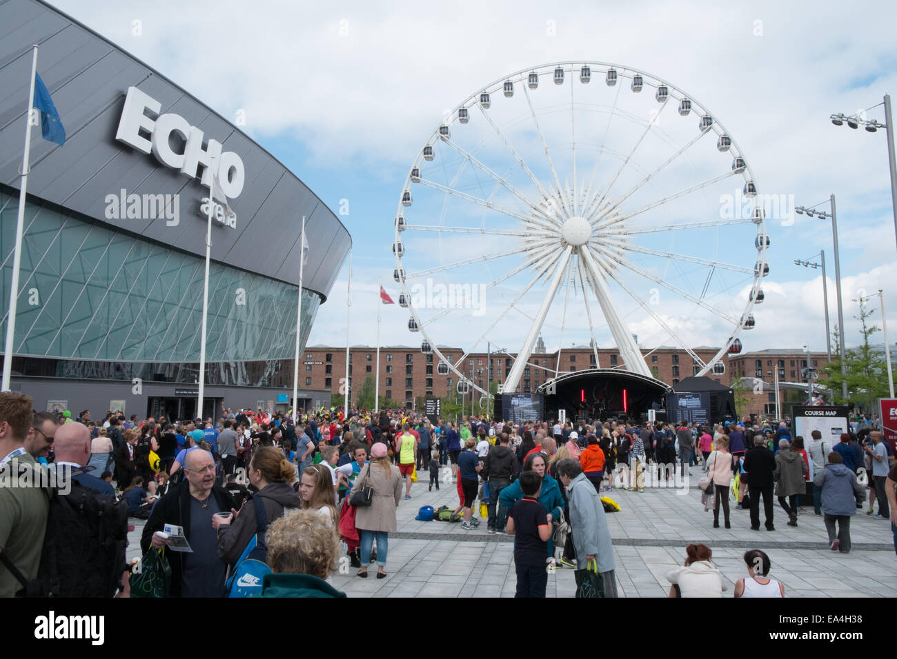 At the end of Liverpool Rock n Roll Marathon at riverside next to Liverpool Echo Arena and Big Ferris Wheel,Liverpool,England, Stock Photo