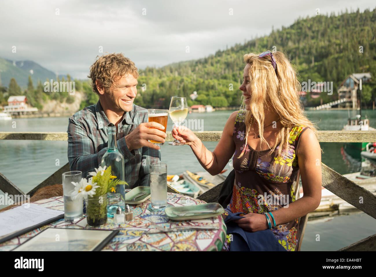 A couple in their 30's enjoys dinner at the Saltry Restaurant in
