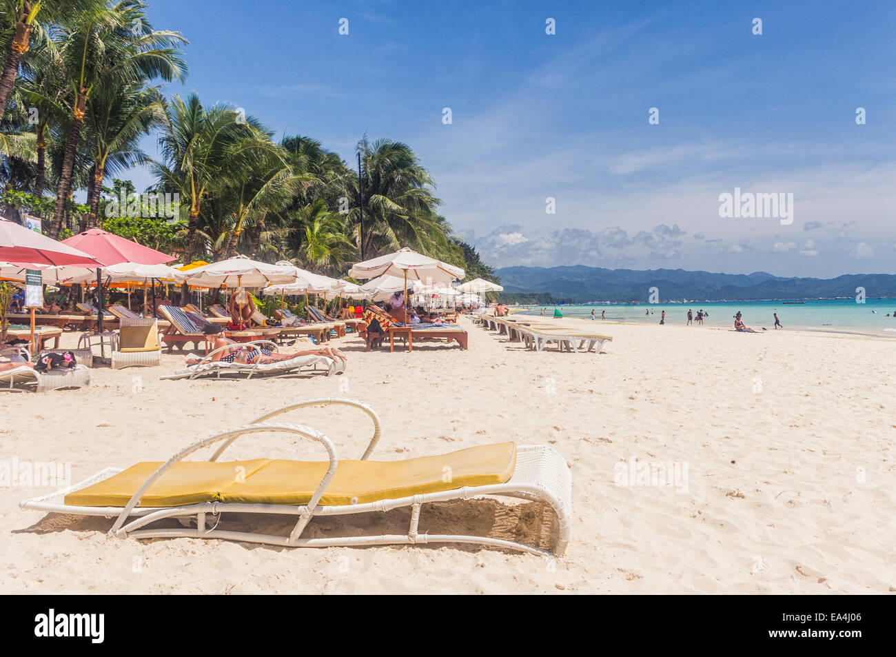 Suntanning tropical resort beach holiday hires stock photography and