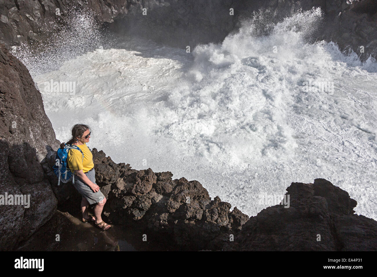 Woman watching waves hi-res stock photography and images - Alamy