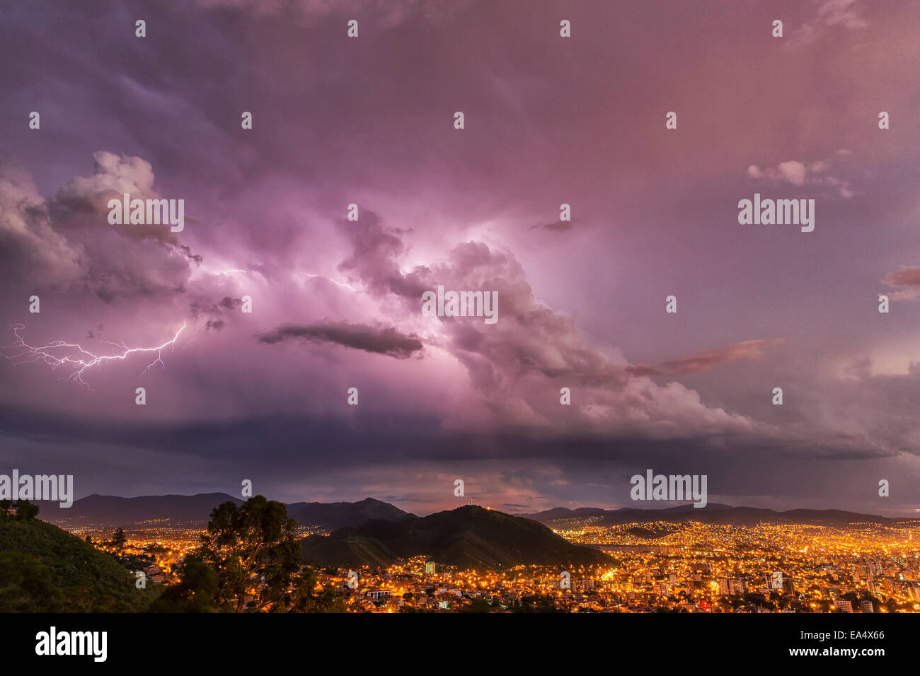 Lightning in the night skies above the city of Cochabamba; Cochabamba, Bolivia Stock Photo