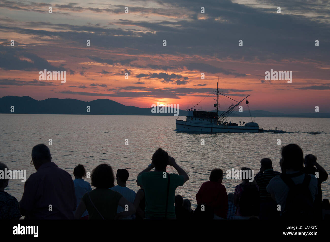 Fishing Boat Sunset Stock Photo - Alamy