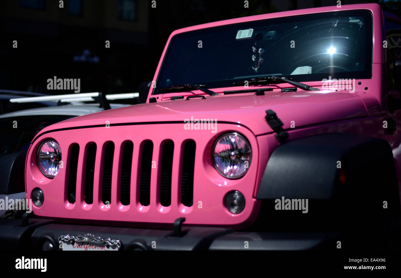 A pink Jeep Wrangler parked in downtown San Diego, California / © Craig M.  Eisenberg Stock Photo - Alamy