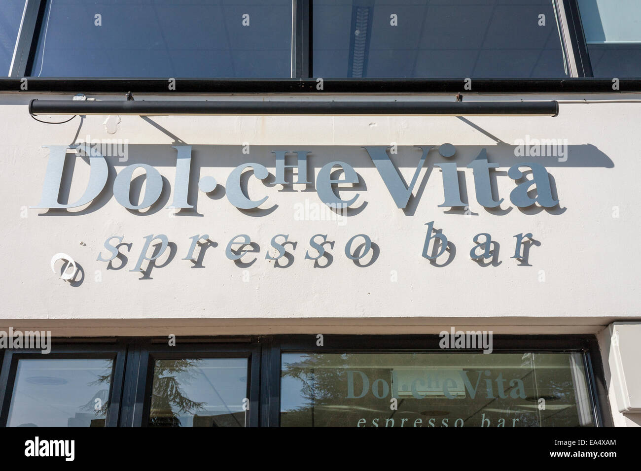 Dolce Vita coffee bar sign with fallen letter 'e'. Stock Photo