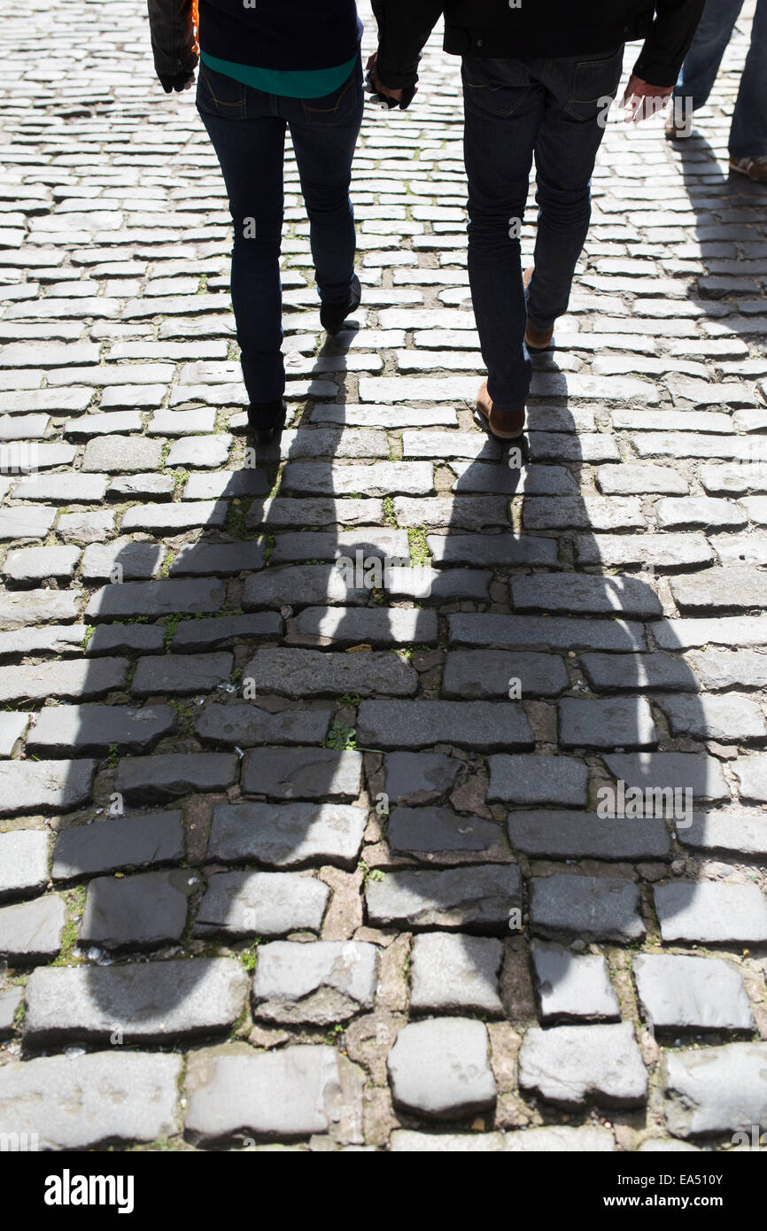 Old couple walking hand in hand hi-res stock photography and images - Alamy
