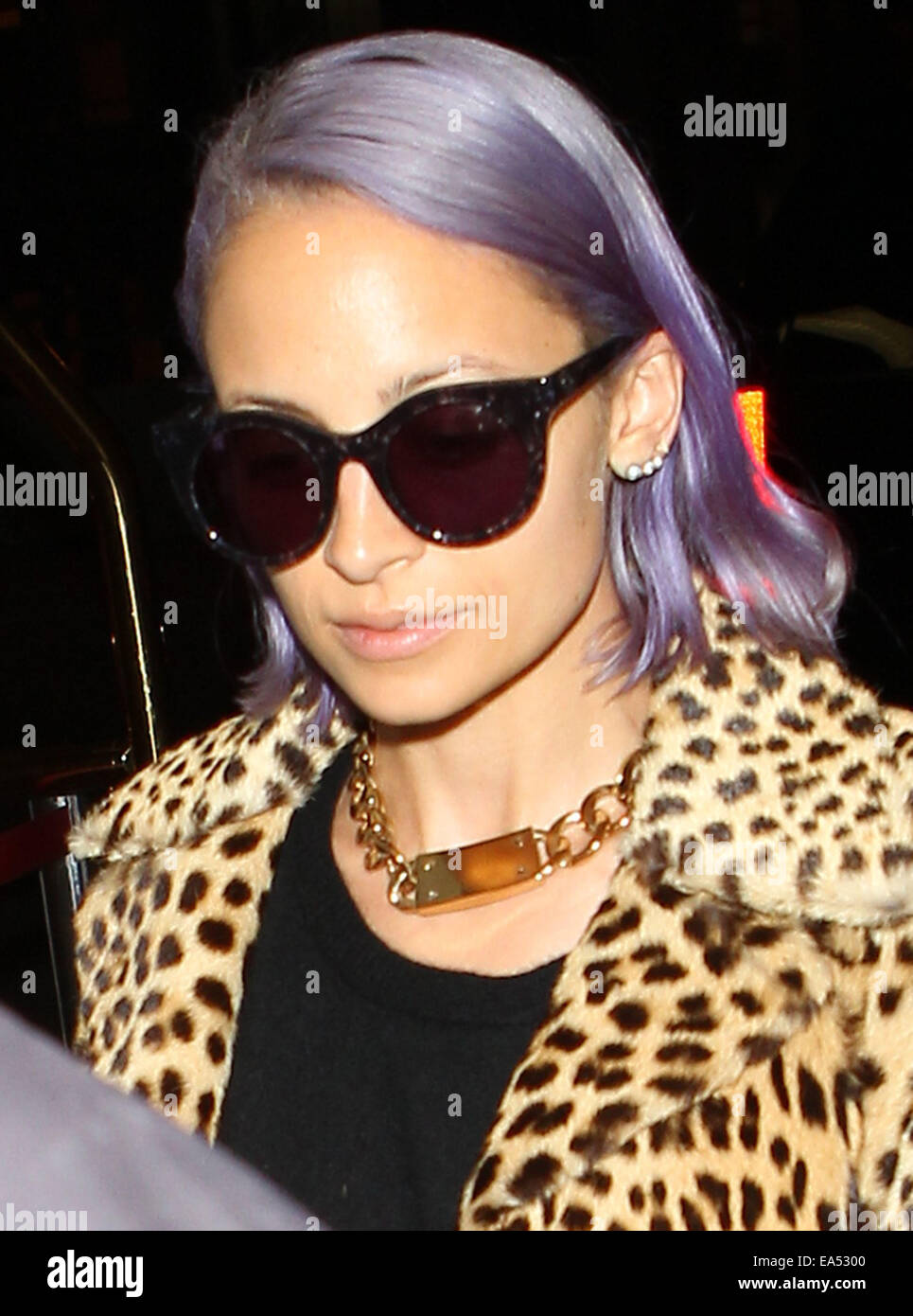 Nicole Richie With Her Hair Dyed Purple Arrives At Los Angeles