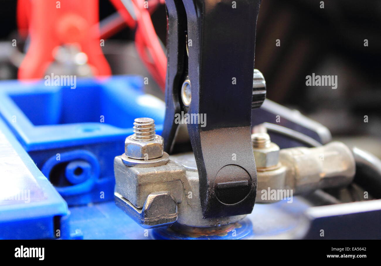 Charger with cables uses to charge dead car battery Stock Photo Alamy