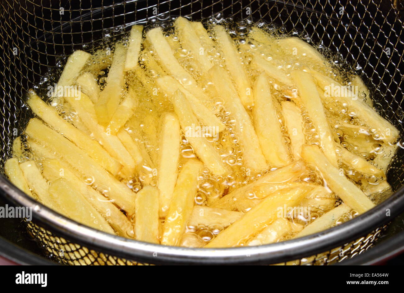 Heap of french fries fried in oil, deep fried, unhealthy and caloric food Stock Photo Alamy