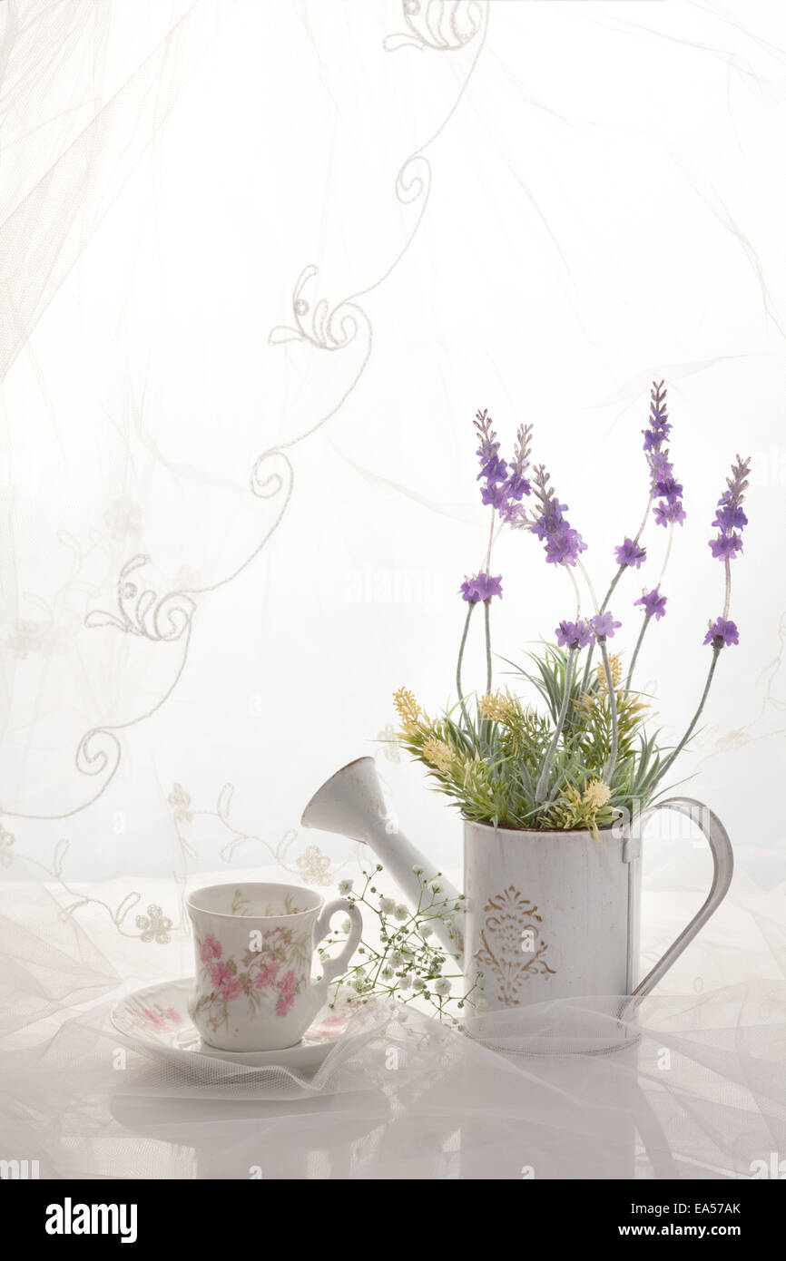 Potted flowers and cup Stock Photo